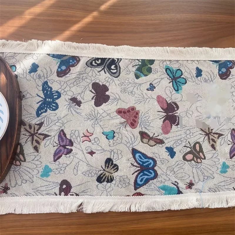 Camino de mesa estilo country americano en algodón y lino con estampado floral y borlas