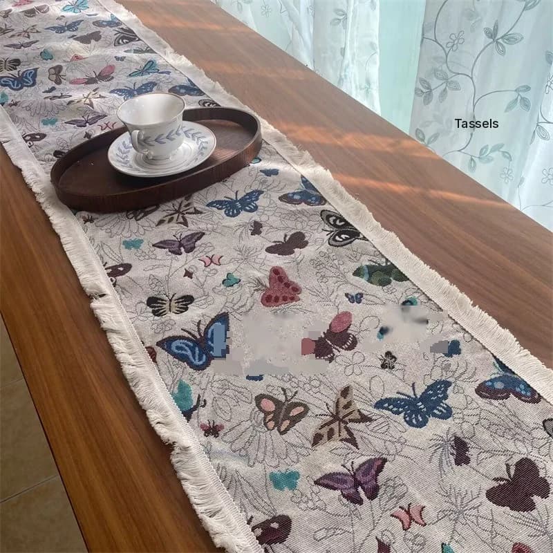 Camino de mesa estilo country americano en algodón y lino con estampado floral y borlas